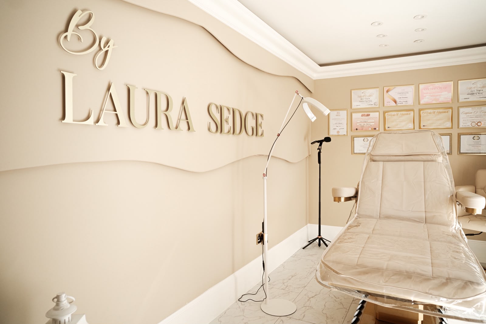 Training certificates and qualifications on display at Laura Sedge Aesthetics